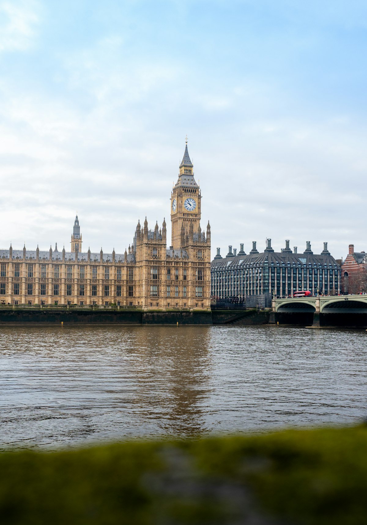 Houses of Parliament UK and Elizabeth Tower beside the River Thames in London