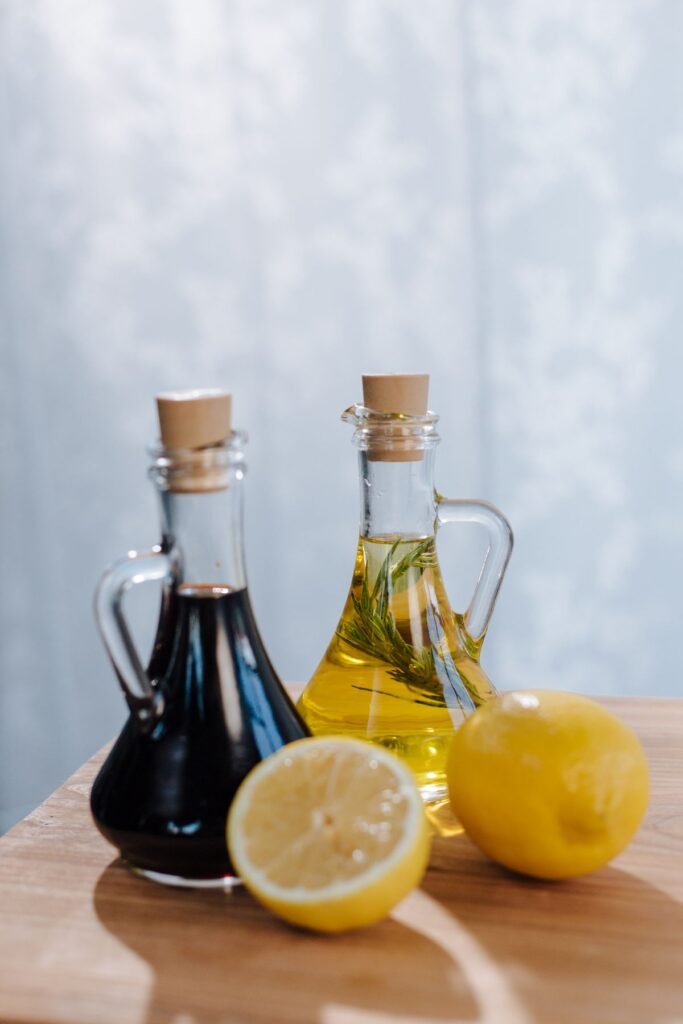 Olive oil, balsamic vinegar, and lemons, the basic ingredients for a healthy salad dressing